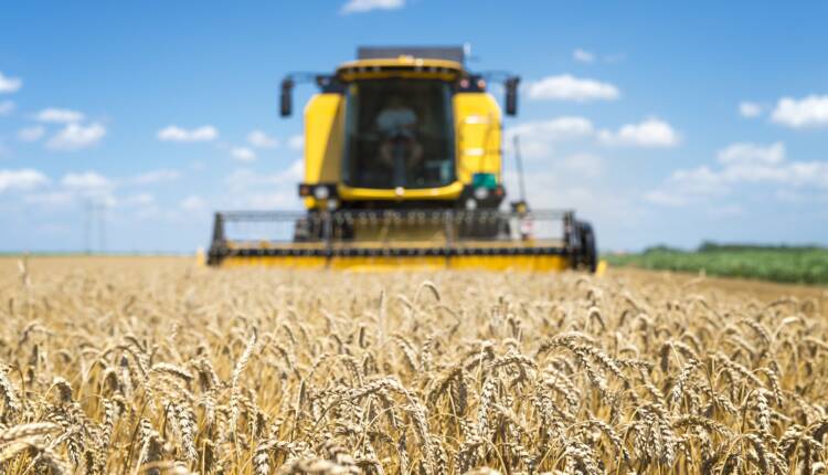 Combine harvester working in the field.