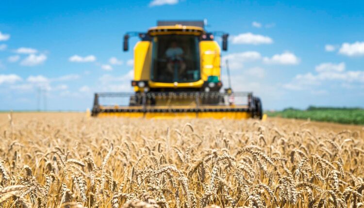Combine harvester working in the field.