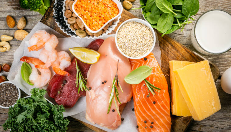 Selection of animal and plant protein sources on wood background